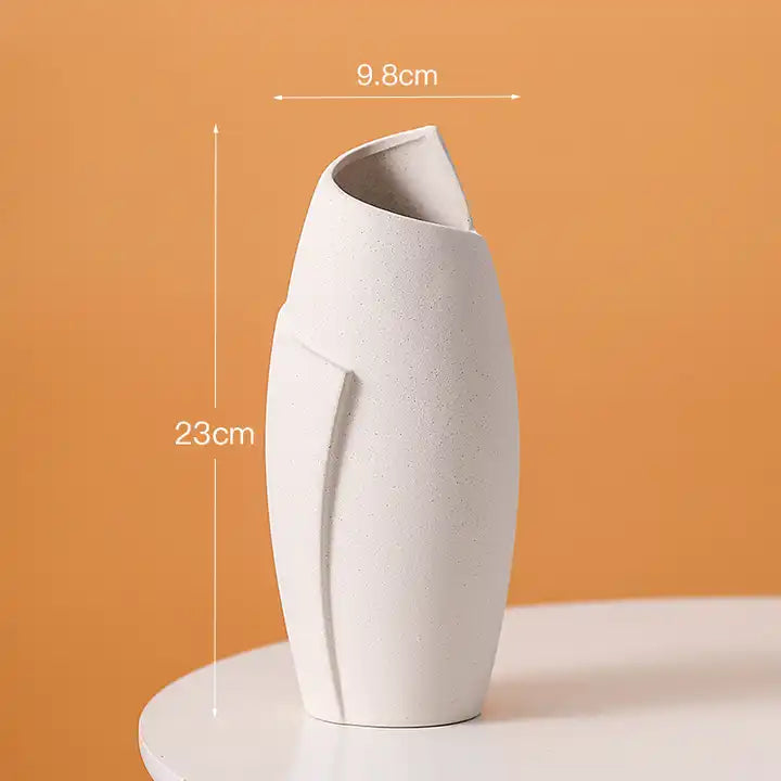 Nordic-inspired ceramic flower pot - an elegant accessory for your desktop or any living space.