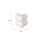 Set of white ceramic vases for home decoration.