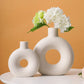 Beige Chic Elegance Nordic Circular Hollow Ceramic Vase.