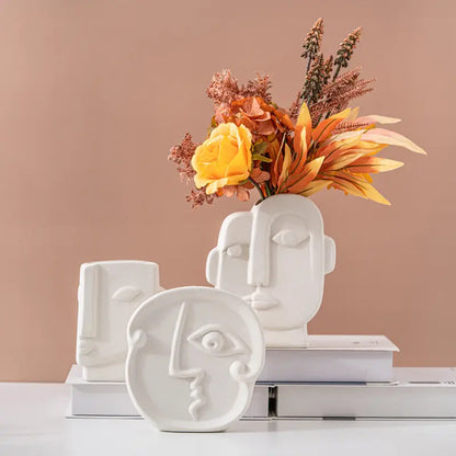 White ceramic vases,faces vases for home decoration.