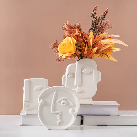 White ceramic vases,faces vases for home decoration.