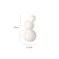 Set of white ceramic vases for home decoration.