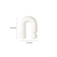 Set of white ceramic vases for home decoration.