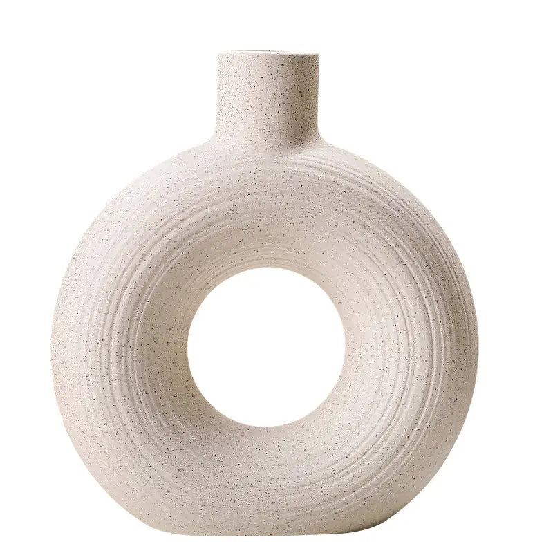 Beige Chic Elegance Nordic Circular Hollow Ceramic Vase.